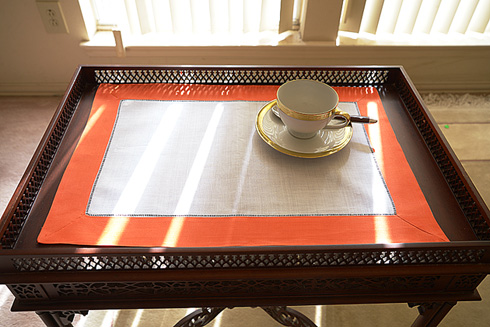 White Hemstitch Placemat 14"x20" with Flame Orange color Border.